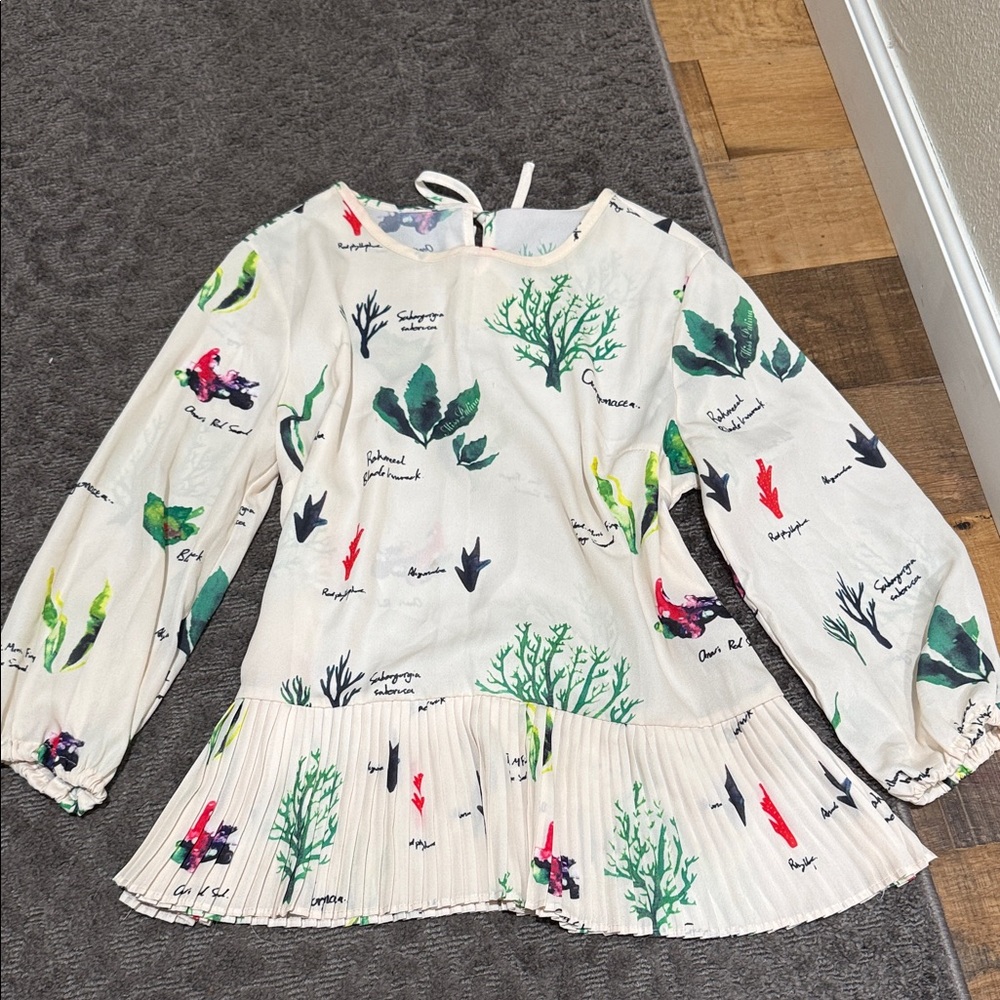 Ivory Botanical Print Pleated Hem Blouse